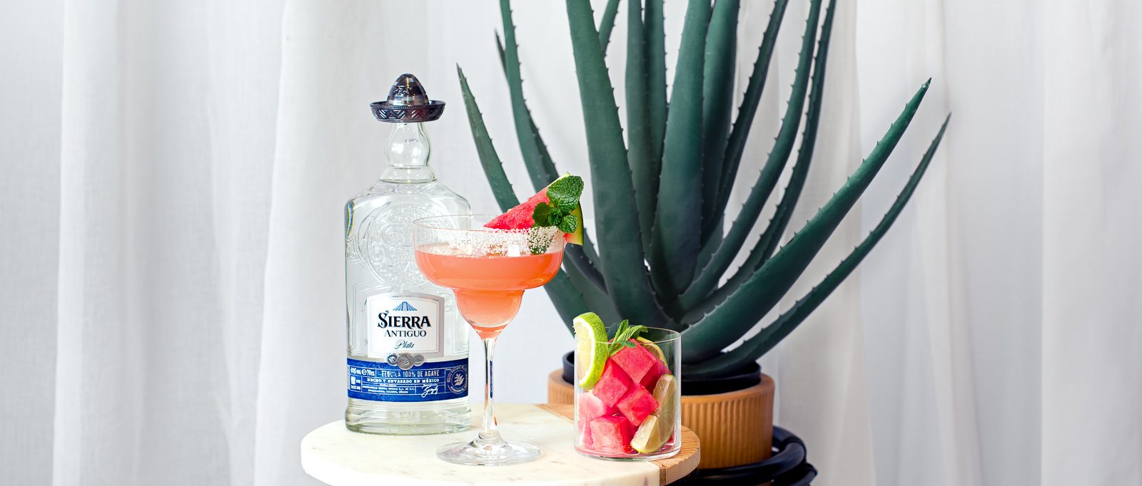 Sierra Watermelon Margarita with a bottle of Sierra tequila